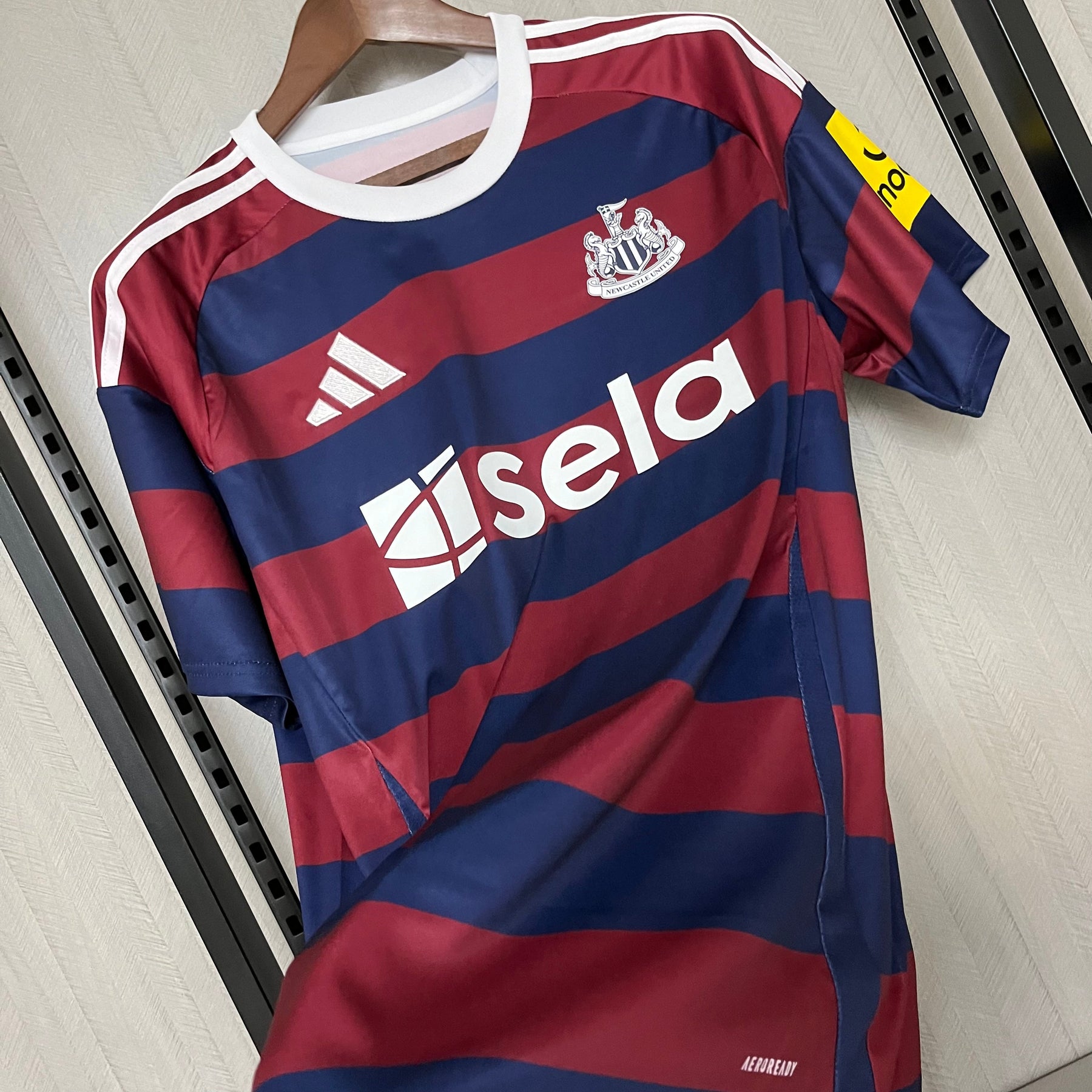 Camisa Newcastle United  24/25 Azul e Vermelha